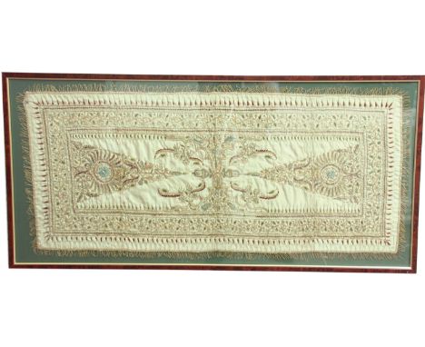 PERSIAN SILK AND GILT THREAD PANEL, a central scrolling floral design on a cream ground inside a meandering foliate border an