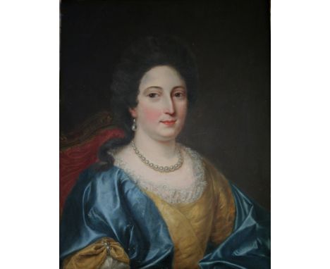 FOLLOWER OF TILLY KETTLE (1735-1786) PORTRAIT OF A LADY Quarter length, wearing a mustard dress and blue mantle, pearl jewell