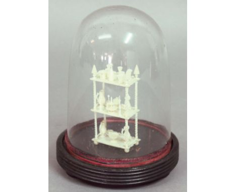 IVORY MINIATURE WHATNOT, Anglo Indian, mid 19th century, the three shelves covered in turned miniature glasses, decanters, cu