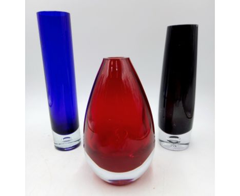 A vintage ruby red art glass vase, a blue vase with clear bubble base and similar in black has slight bruise to rim.