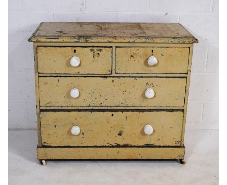 A Victorian cream painted pine chest of four drawers, with ceramic handles and castors - length 100cm, depth 46.5cm, height 8