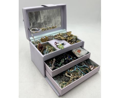 A collection of vintage costume jewellery, brooches etc.