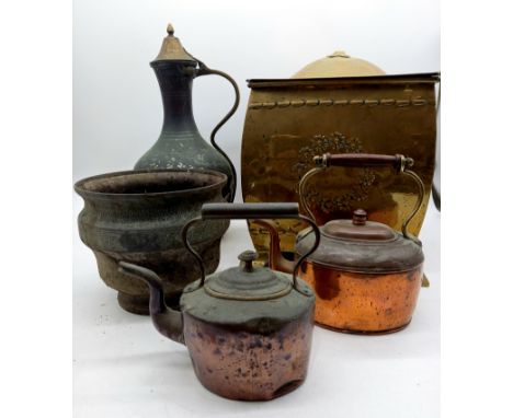 An antique brass coal box, two copper kettles, Indian decorated planter, and a Turkish copper vessel.