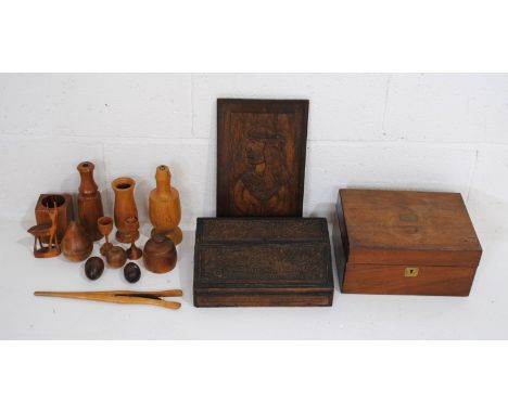 A heavily carved hardwood writing slope, along with a Victorian mahogany box (A/F), a carved oak panel, a quantity of various