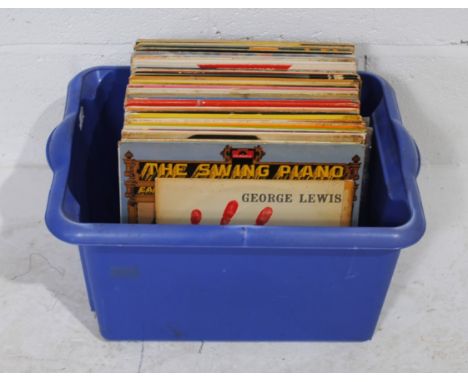 A quantity of 12" vinyl records, consisting of mostly jazz, including Chris Barber, George Lewis, Jelly Roll Morton, Django R