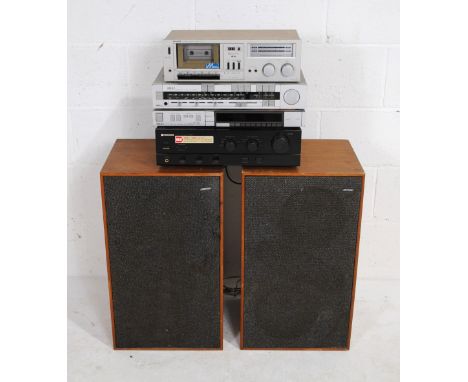 A vintage stacking hi-fi system, comprising a Pioneer A-335 amplifier, Akai AT-53L tuner, Akai AA-R1L receiver, Sharp RT-10 c
