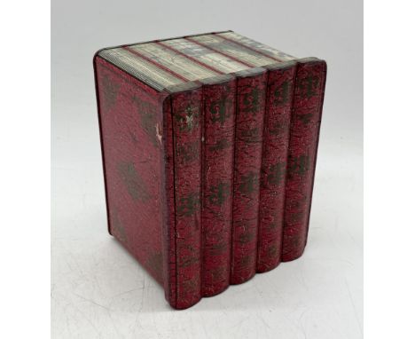 A vintage Cadburys Charles Dickens tin the form of five novels