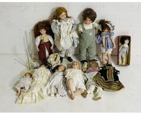 A collection of vintage collector's dolls including porcelain dolls, Alberon etc (some stands included) - in three boxes.