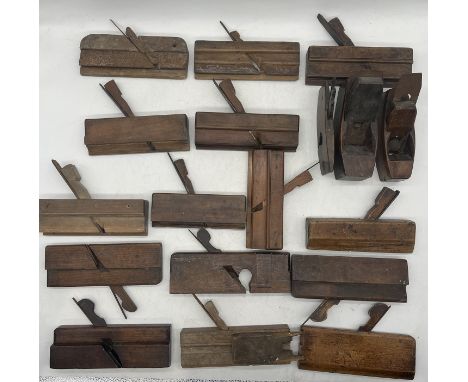 A selection of antique and vintage wood working planes.