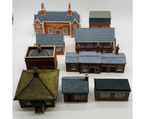 A collection of well-built model railway O gauge buildings by Hornby Hobbies, Bachmann etc, including a "Jackson" railway sta