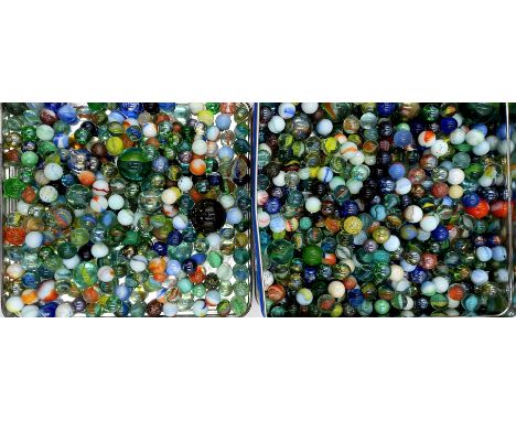 A collection of assorted vintage glass marbles.