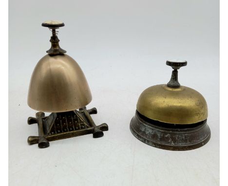 Two vintage brass receptionists bells both with ceramic knops, largest 12 cm high.