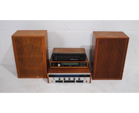 A vintage stacking hi-fi system, comprising a Leak 2000 tuner amplifier, Amstrad Multiplex 3000 tuner, Amstrad 3000 MKII tune