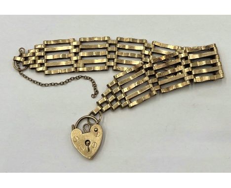 A 9ct gold gate bracelet - weight 10.5g