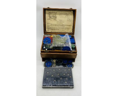 A collection of vintage Meccano in wooden storage box