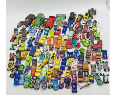 A collection of playworn die-cast vehicles including Matchbox, Hotwheels, Mattel, Saico etc 