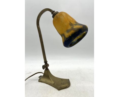 An Art Nouveau brass lamp with mottled glass shade (small chip to underside of shade) marked for Muller Freres - Lunville.  