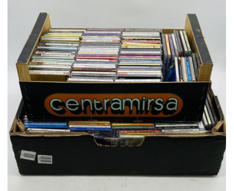 A collection of various CD's including Janis Joplin, Donovan, Beach Boys, James Taylor, Van Morrison, Dire Straits, Roxy Musi