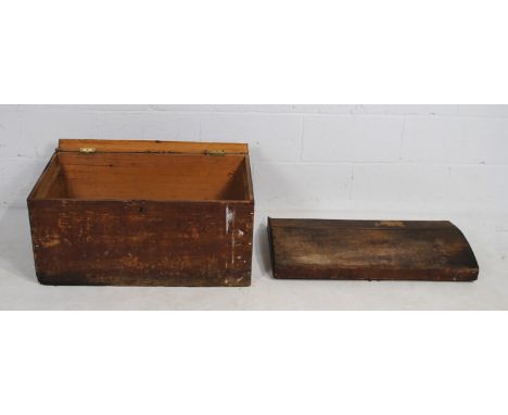 An antique pine dome-topped trunk, with wrought iron handles - in need of restoration