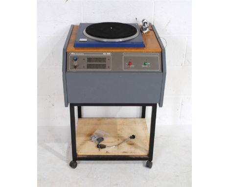 A Technics SP-10 MKII direct drive turntable with SME 3009 tonearm, mounted on a vintage Alice broadcasting GU 200 unit, with