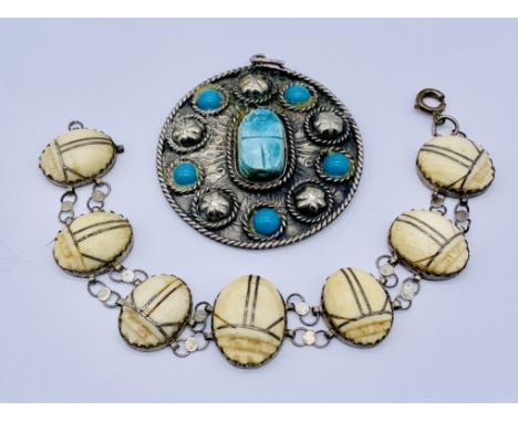 A vintage SCM scarab bracelet A/F and a SCM scarab pendant.