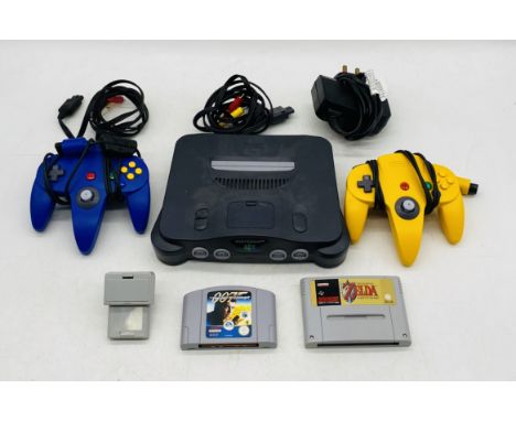An unboxed Nintendo 64 games console with two controllers, power cables and two games - untested