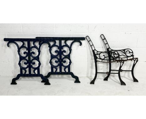 A pair of blue painted cast iron table ends along with a smaller pair of bench ends 