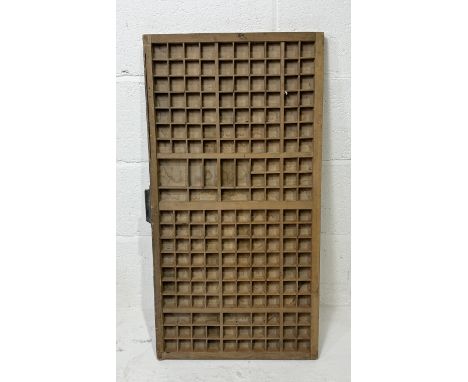 A vintage wooden printers tray