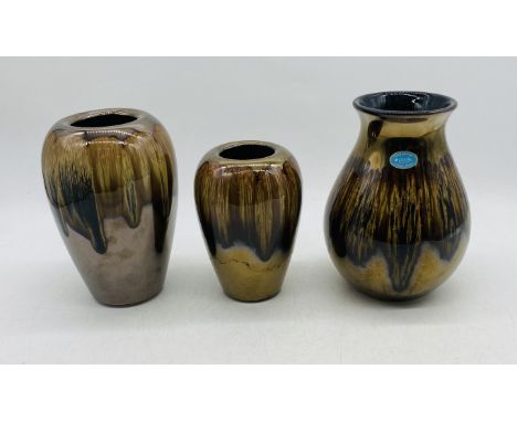 Three Poole Pottery "Precious" vases including two concave vases and one venetian vase - tallest 22cm in height