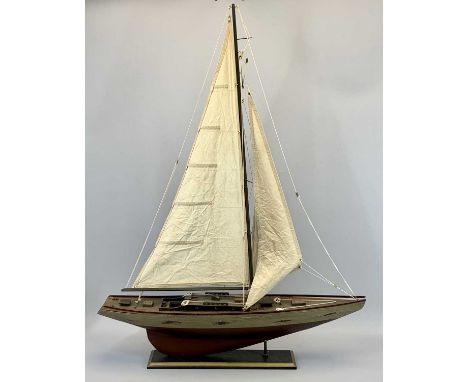 A WOODEN MODEL OF A SAILING SHIP - single masted with full rigging, 99cms H, 78cms L