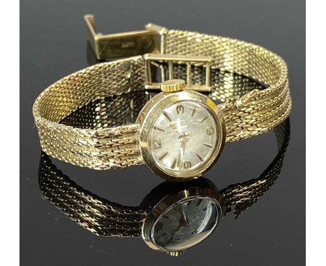 9CT GOLD LADY'S VINTAGE WRISTWATCH - with integral 9ct bracelet, the dial set with Arabic numerals at the quarters with furth
