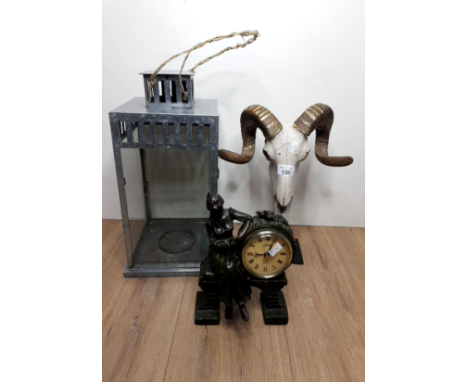 A CANDLE LANTERN ART DECO STYLE CLOCK AND ORNATE RAM SKULL