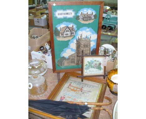 2 Walking sticks, umbrella , a framed needlework sampler dated 1937, a firescreen , etc.