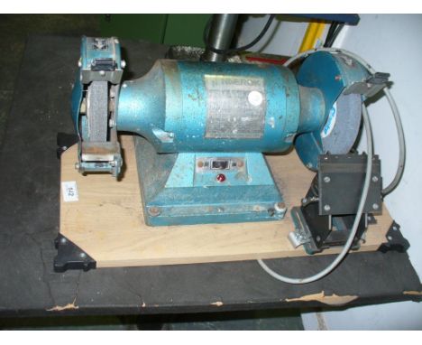 An Electric bench grinder.