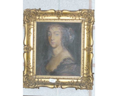 A portrait of a young woman , oil on canvas within an ornate gilt frame.