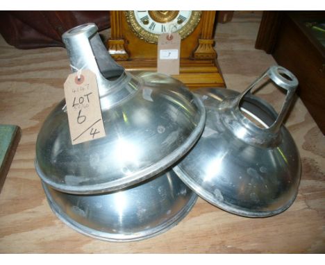 Six metal industrial type hanging light shades.