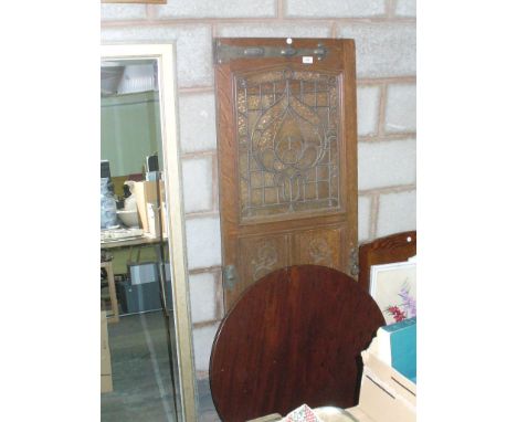 An Art Nouveau oak door with a leaded glass panel and a Georgian mahogany tripod table top.(2)