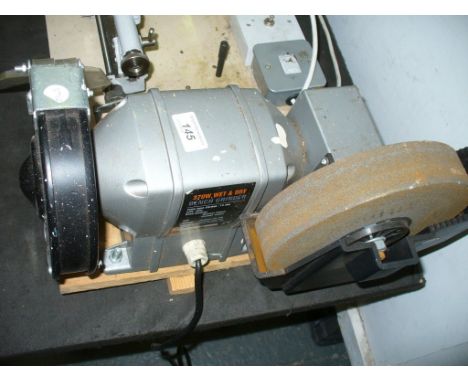 A Wickes electric bench grinder.