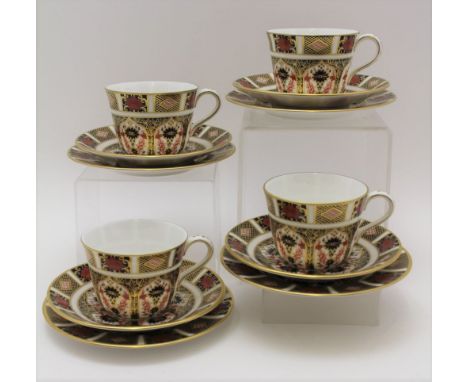 FOUR ROYAL CROWN DERBY BONE CHINA OLD IMARI 1128 CUPS &amp; SAUCERS together with four 16cm tea plates (seconds) 