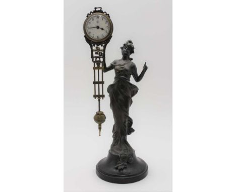 A CONTINENTAL ART NOUVEAU NOVELTY CLOCK, in the form of a spelter young woman on a plinth base, her right hand supporting the