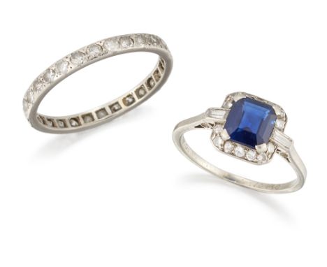 An Art Deco platinum, sapphire and diamond cluster ring, and a diamond eternity ring, the cluster ring with rectangular step 
