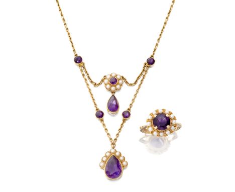 An Edwardian amethyst and seed pearl necklace, designed with two pear-shaped amethyst drops to seed pearl surmounts and colle