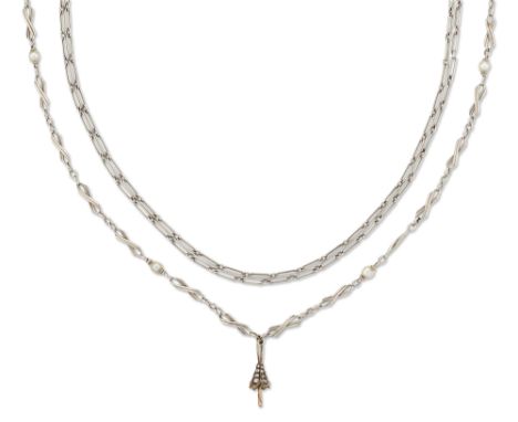 Two early 20th century platinum chains, comprising: a French platinum fetter link chain, broken in one place, circa 1910, eag
