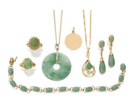 A group of jade jewellery, comprising: a 9ct gold nephrite oval cabochon ring, approximate ring size J; a pair of jade drop e