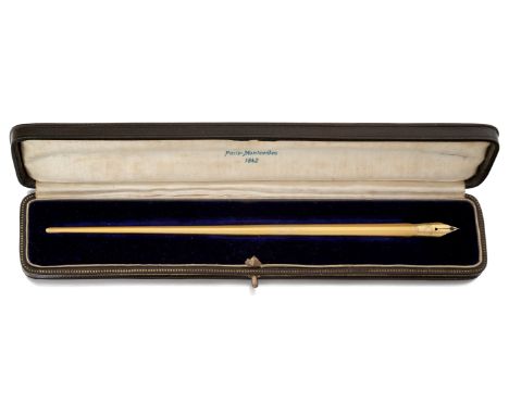A 19th century gold dip pen, of tapering design, with nib, signed Waterman's Ideal, length including nib 18.5cm, in retailers
