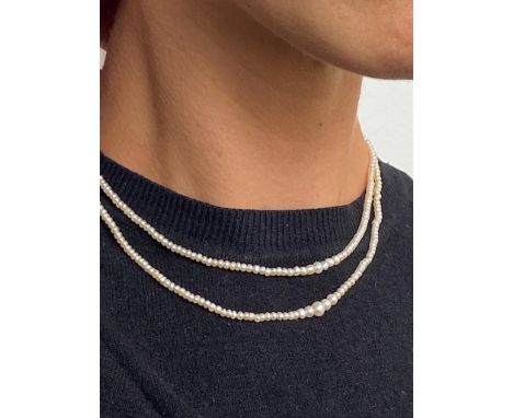 A two row seed pearl necklace, with two rows of graduated seed pearls, strung plain to 9ct gold half-pearl and enamel box cla
