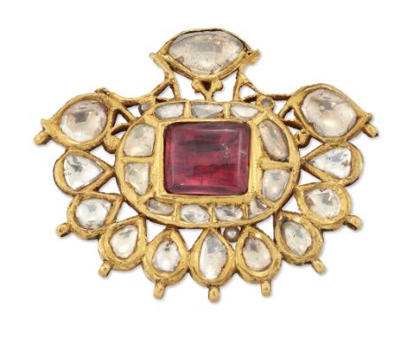 An early 20th century Indian kundan panel, the reverse decorated with Jaipur polychrome enamel, the front set with vari-shape