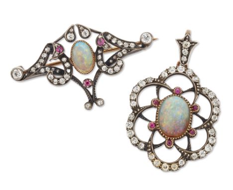 Two early 20th century opal, ruby and diamond brooches, one Art Nouveau example with a central cabochon opal to whiplash styl