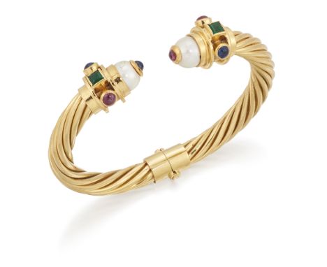 A cultured pearl and gem hinged torc bangle, of twisted wire-work design, each terminal  collet set with a single cultured pe