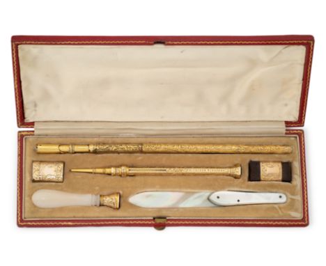 A group of writing accessories, including a 19th century gold mounted dip pen with foliate engraved shaft and Bramah style ni